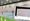 Närkästynyt kansalainen latasi kuvan erikoisesta työpaikkailmoituksesta Facebookiin. Taustalla kuvituskuva sulkapallohallista.