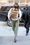 Kendall Jenner yhdistää neuleliivin paitapuseroon, suoriin housuihin ja loafereihin.