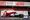 Kimi Räikkönen (vas.) ja Antonio Giovinazzi repivät peitteet uuden Alfa Romeon päältä pois. 