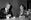 Ari Vatanen (vas. ) ja toimittaja Timo Putkonen  kaupunginjohtaja Teuvo Auran Hankirallin kahvitilaisuudessa Helsingin Kaupungintalolla 4. maaliskuuta 1976. LEHTIKUVA / STEVE POWELL