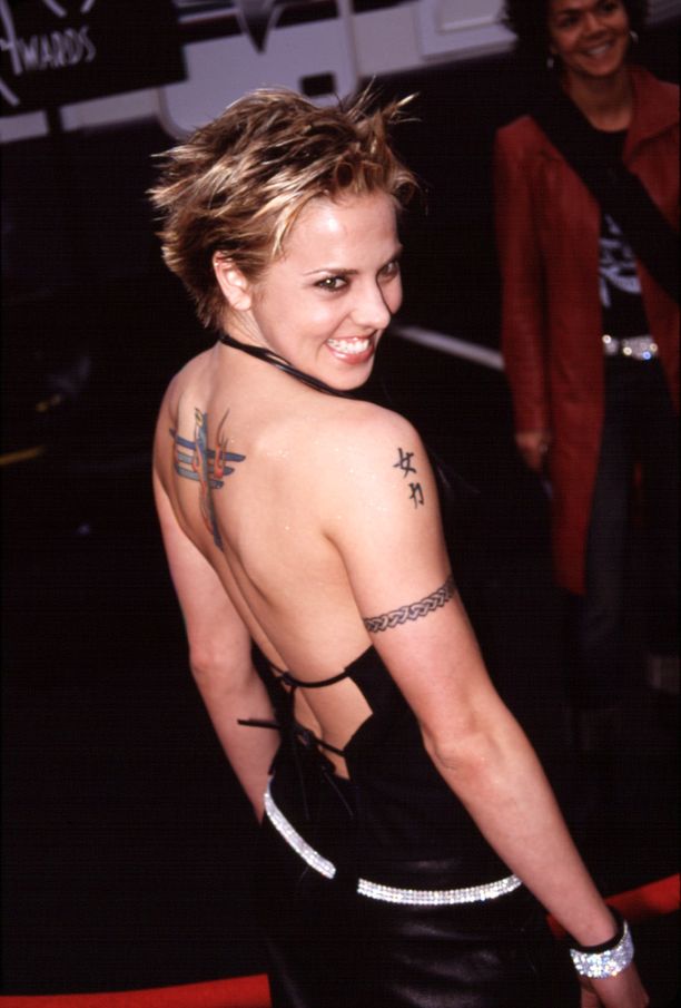 Sporty Spicen tatuoinnit tekivät moniin vaikutuksen 1990-luvulla. Kuvituskuva.