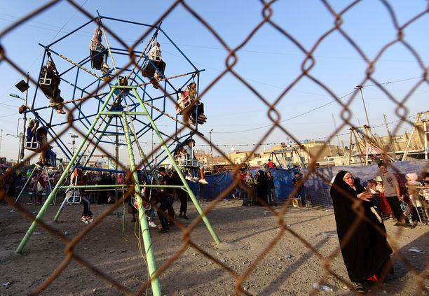 Irakilaisia lapsia leikkimässä Eid al-Fitr -juhlan aikaan Bagdadissa.