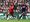 Liverpoolilla ja Mohamed Salah on valioliigamestaruus hyppysissä. Kuvassa Salahin menoa seuraa Bournemouthin Junior Stanislas.